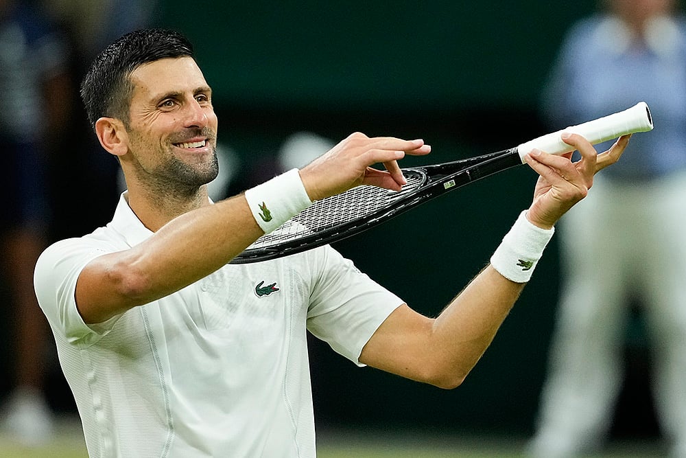| Photo: Mosa'ab Elshamy : Djokovic celebrates after defeating Holger Rune 